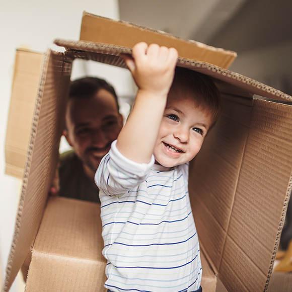 home-2-product Young boy playing inside a cardboard box to promote home insurance by Evalee Insurance Brokers