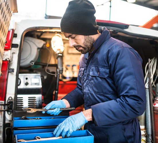 Tradesman checking over tools to promote tradesmen insurance by Evalee Insurance Brokers